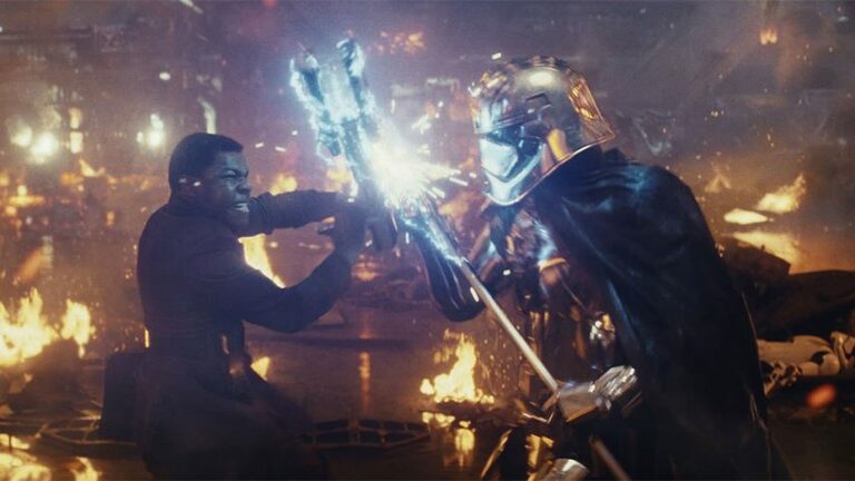 Star Wars: The Last Jedi..L to R: Finn (John Boyega) battling Captain Phasma (Gwendoline Christie)..Photo: Lucasfilm Ltd. ..© 2017 Lucasfilm Ltd. All Rights Reserved.