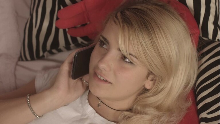 Charlotte-Ramona-Marquez-on-phone