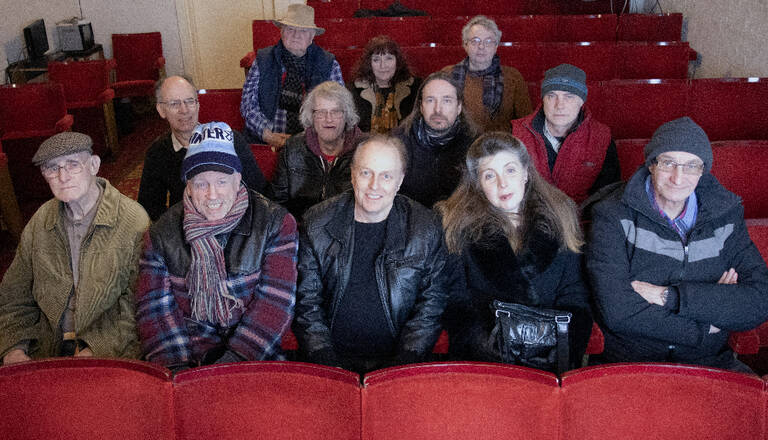 The title refers to members of Bradford Movie Makers, a largely working class amateur film making club that has been going since 1932.