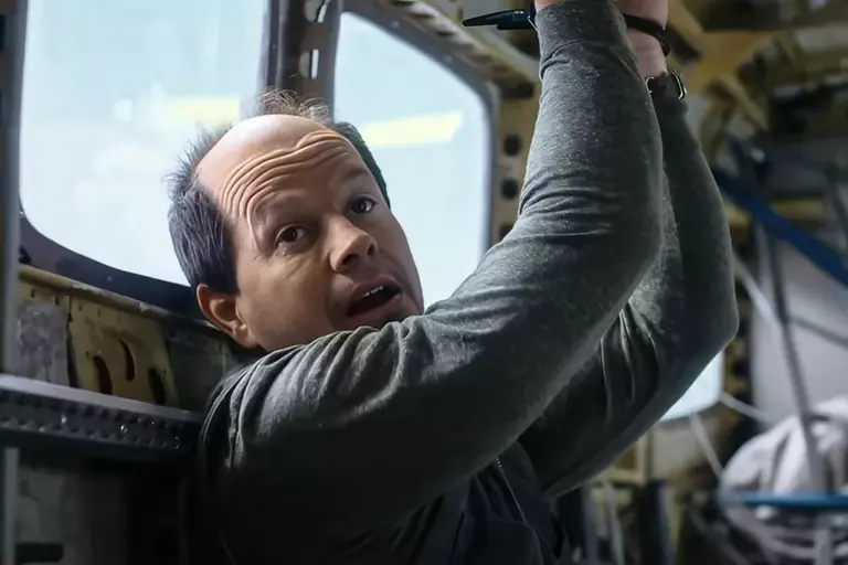Mark Wahlberg trades his usual tough-guy persona for a more duplicitous turn as a pilot with hidden motives.