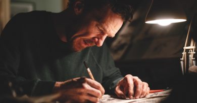 The thing with feathers is a giant crow – man-size, very black and feathery, very threatening.